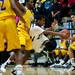 Huron sophomore Brian Walker is fouled in the game on Friday, March 8. Daniel Brenner I AnnArbor.com